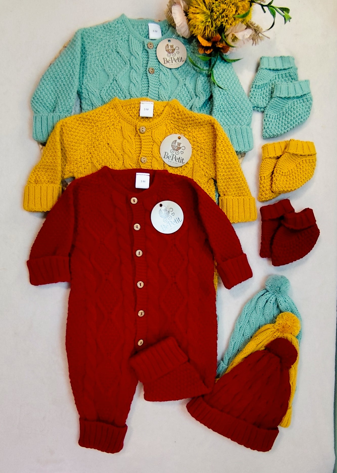 Conjunto de macacão com gorro e carapins