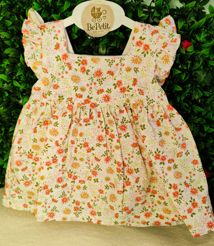 Vestido florido com laço