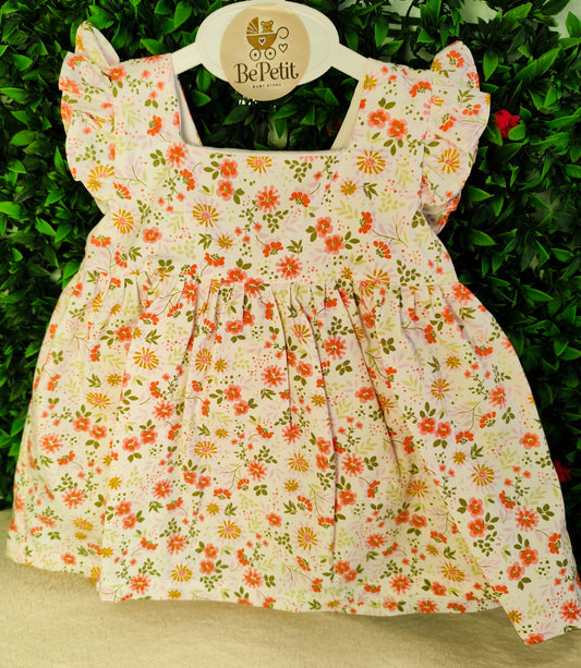 Vestido florido com laço